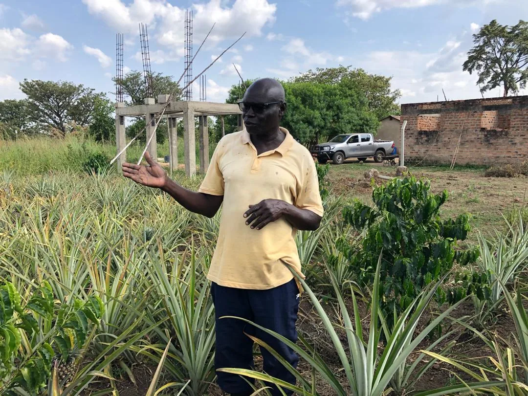 YWAFT project director speaking during a field interview at the demonstration farm